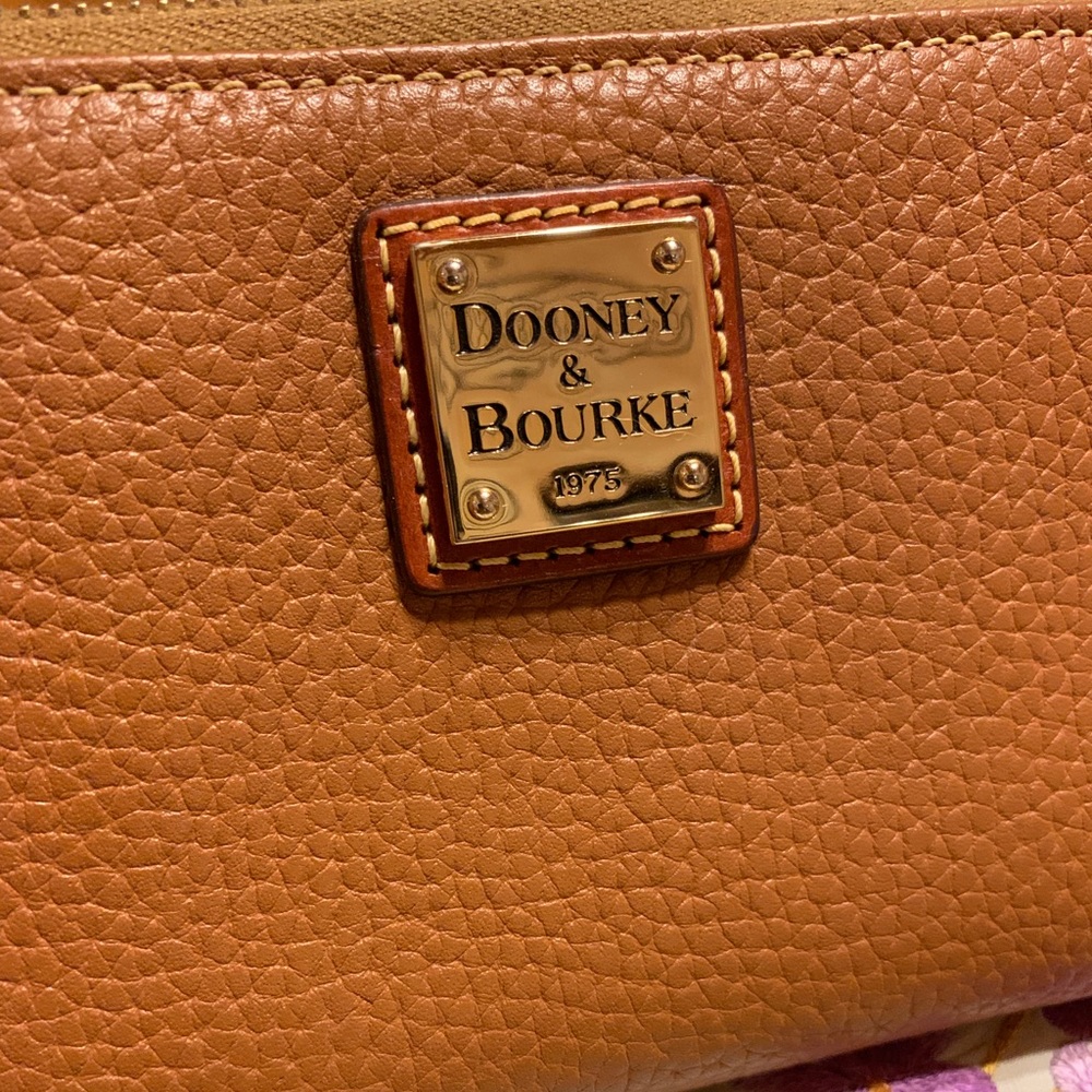 Dooney & Bourke Zip around wristlet.